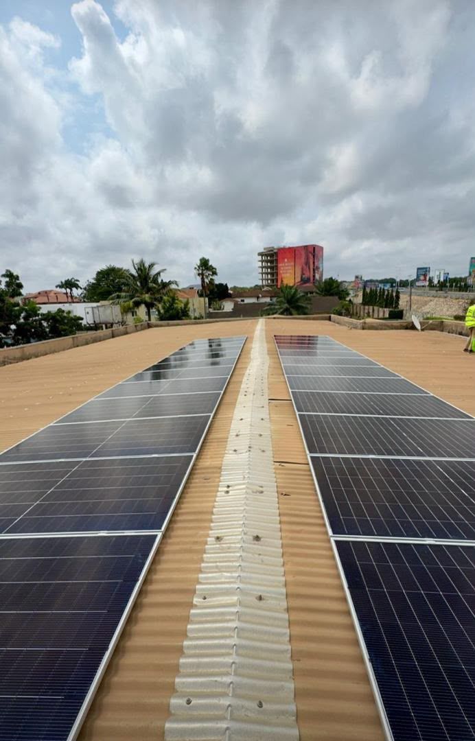 Photovoltaic installation showing parallel rooftop solar arrays
